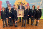 Stephen greets pupils and presents them with a Platinum Jubilee Certificate